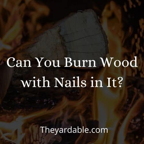 burning wood with nails in it